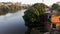 Mighty Paraiba do Sul river in Volta Redonda, Rio de Janeiro, Brazil. houses on the banks of the polluted river