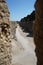 Mighty stone wall surrounding the medieval fortress town of Rhodes, Greece