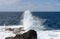 mighty wave breaks on the coast of El Hierto, one of the idols of the Canary Islands, Spain.
