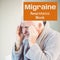 Migraine awareness week text on orange over distressed senior caucasian man holding head in pain