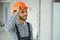 A migrant worker poses for a photo on a city centre construction site in Singapore. The SE Asian city state has a
