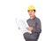 Migrant worker wearing yellow hard hat holding drawings in hand in front of white background