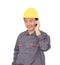 Migrant worker wearing yellow helmet is calling