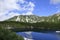 Mikurigaike pond and Tateyama mountain range with snow in summer