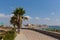 Mil Palmeras Costa Blanca Spain view from the paseo promenade to the beach and town with palm trees