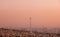 Milad Tower in the Skyline of Tehran at Pink Sunset