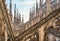 Milan Cathedral or Duomo di Milano, Italy. Scenery of amazing luxury roof. Famous Milan Cathedral is a top tourist attraction of