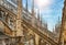 Milan Cathedral or Duomo di Milano on sunny day, Italy. Nice view of luxury roof. Famous Milan Cathedral is a top landmark of city