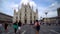 Milan, Italy - 14.08.2018: Tourists visiting the Piazza Duomo square in Milan.