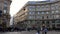 Milan, Italy 17 Dec 2022: Piazza Cordusio city famous square in Central Milan. Shopping and bank street panorama video shops and