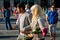 Milan, Italy - 20 june 2018: couple of young muslim moroccan people just married walk in the city center in