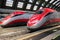 Milan, Italy - August 10, 2020 two `Frecciarossa` trains at Milan Central railway station