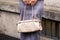 Milan, Italy - February, 22, 2024: woman wears Prada bag, fashion blogger outfit details