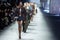 MILAN, ITALY - FEBRUARY 24: Models walk the runway finale at the Tods fashion show during the Milan Fashion Week