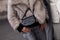 Milan, Italy - January, 14, 2024: woman wears Diesel bag, street style details, fashion detail