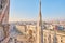 Milan, Italy - January 21 2019: Amazing view of old Gothic spires. Milan Cathedral roof on sunny day, Italy. Milan