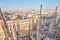 Milan, Italy - January 21 2019: Amazing view of old Gothic spires. Milan Cathedral roof on sunny day, Italy. Milan