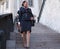 MILAN, ITALY -JUNE 15, 2018: Alitalia hostess walking for photographers on Arengario stairs after ALBERTA FERRETTI fashion show