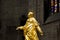 Milan, Italy - September 05, 2017: Interior of Milan Cathedral Duomo. Statue of golden Madonna.