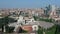 Milan Monumental Cemetery aerial view - Milan skyline with skyscrapers on the background