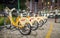 MILAN - SEPTEMBER 25, 2015: Bike Mi bicycles parked at night. Th