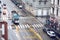 Milan. Street Panorama in Milan with Tram after Rain. Aerial View. Pedestrians and Cars on a Cloudy Day. Bus