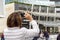 MILANO ITALY , 13 .MARCH 2019 : photografer make a photo of tourists in a new finantial district