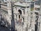 Milano, Italy. The entrance to the famous Vittorio Emanuele shopping mall from the top of the Duomo. The spiers of the Duomo in wh