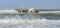 Mile 108, Namibia - June 21 2014: Shipwreck Zeila laying on sandbank during storm and waves