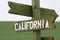 Mile signpost to California