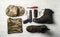 Military accessories on wooden background, top view