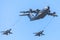 Military Airbus A 400 M transport plane flies with two Panavia Tornado multirole combat aircrafts