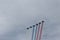 Military aircraft in the sky over St. Petersburg paint in the sky of the Russian tricolor