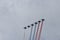 Military aircraft in the sky over St. Petersburg paint in the sky of the Russian tricolor