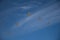 Military airplanes lined up in a row during the Russian military parade on bright blue sky with clouds