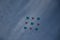 Military airplanes lined up in a row during the Russian military parade on bright blue sky with clouds