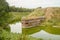 Military bunker with water around in Lithuania