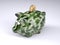 Military camouflage painted piggy bank with dollar coin