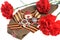 Military cap with red flowers, Saint George ribbon, orders of Great Patriotic war