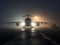 Military Cargo Plane on a Foggy Runway