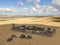 Military compound in the middle east, aerial view of a military base. Guard towers and reinforced concrete fence