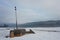 Military concrete pillbox - bunker in a snowy country