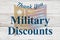 Military Discount message with an old metal American flag