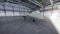 Military drone stands in his hangar on a Sunny day. 3D Rendering