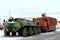 Military equipment - an armored troop-carrier and the truck with