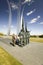 Military family look at Bronze Honor Guard and three soaring spires of the Air Force Memorial, Arlington, Virginia in Washington