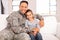 Military father sitting daughter