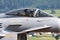 Military fighter jet plane at air base. Airport and airfield. Air force flight operation. Aviation and aircraft. Air