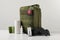 Military first aid kit, tourniquet, drops and elastic bandage on white table