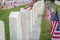 Military Grave Markers With Hand Touching Tombstone